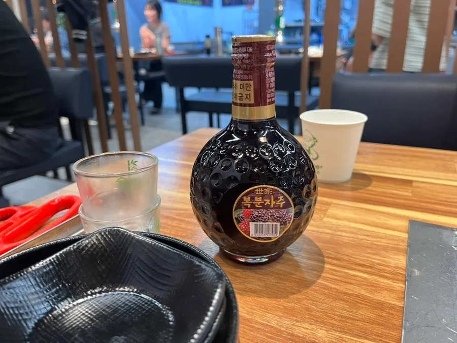 Bokbunja wine served when ordering the dinner eel all-you-can-eat