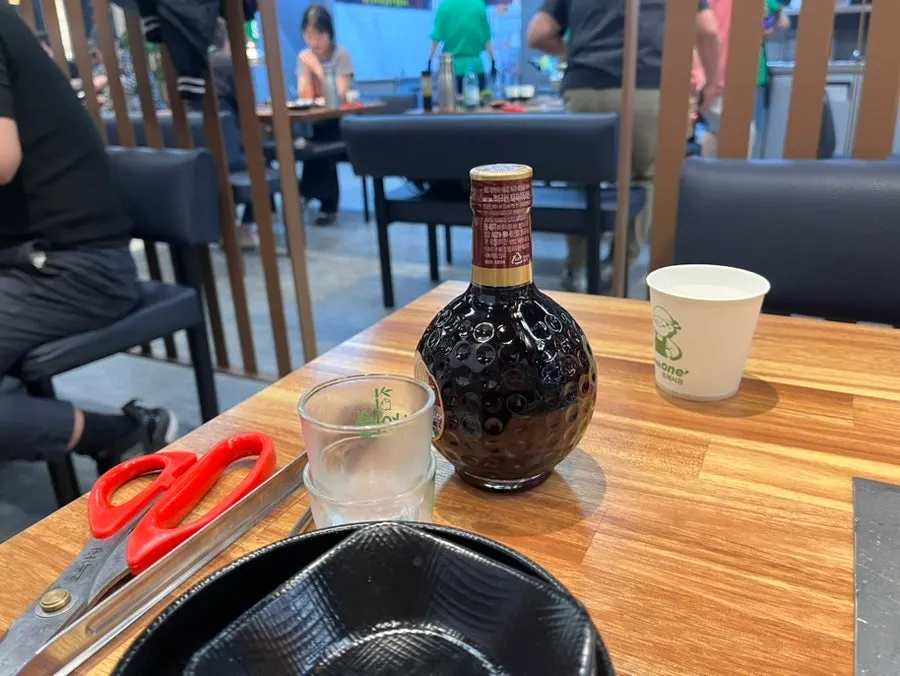 Bottle of bokbunja wine provided as a service