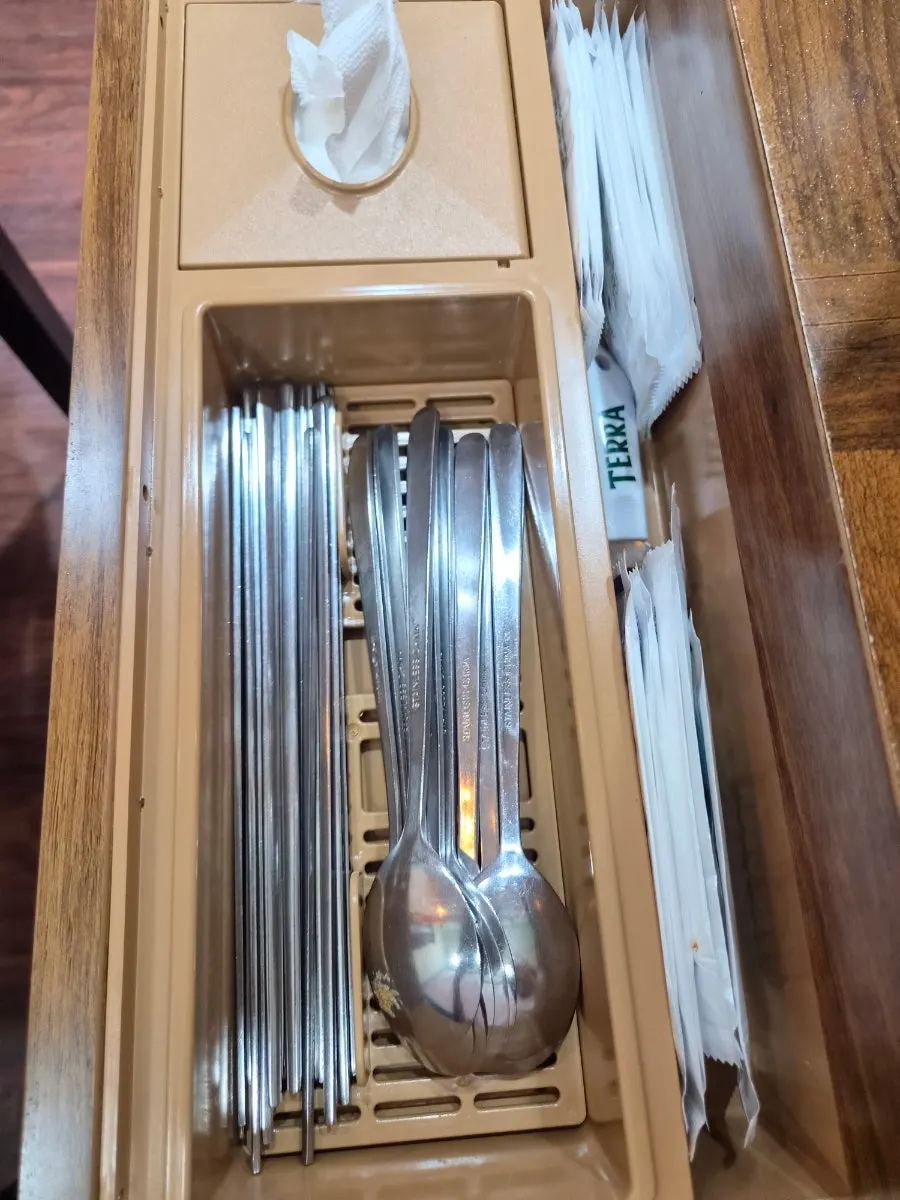 Table drawer with chopsticks and wet wipes
