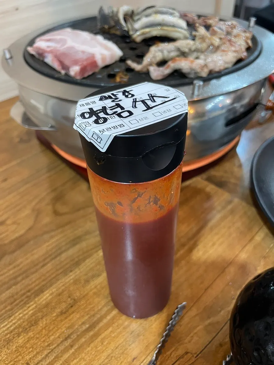 Grilled eel dipped into the mixed sauce
