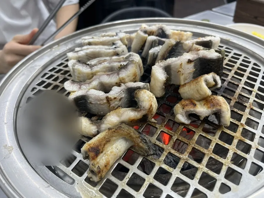Plate of unlimited freshwater eel served at the table