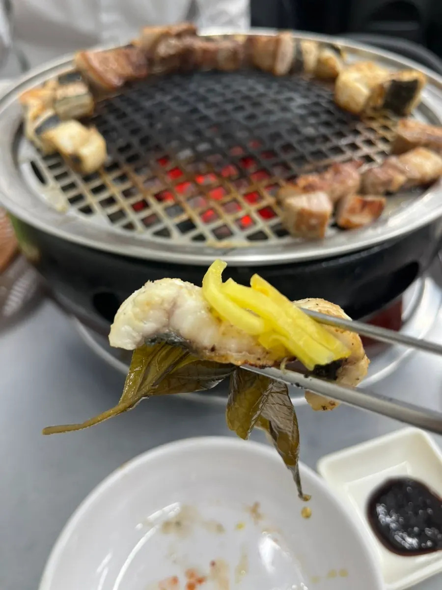 Picking up a piece of grilled eel