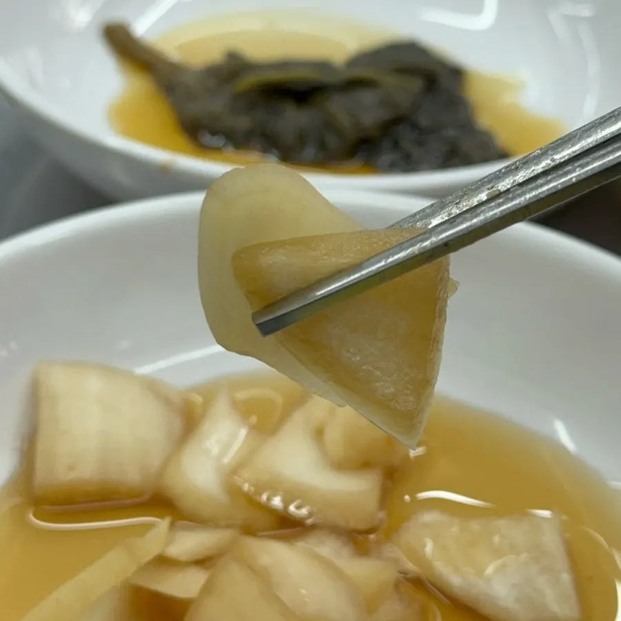 A piece of eel paired with pickles