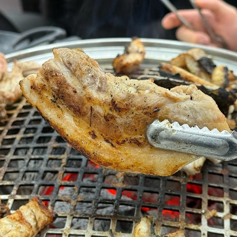 A plate of pork belly and chicken neck