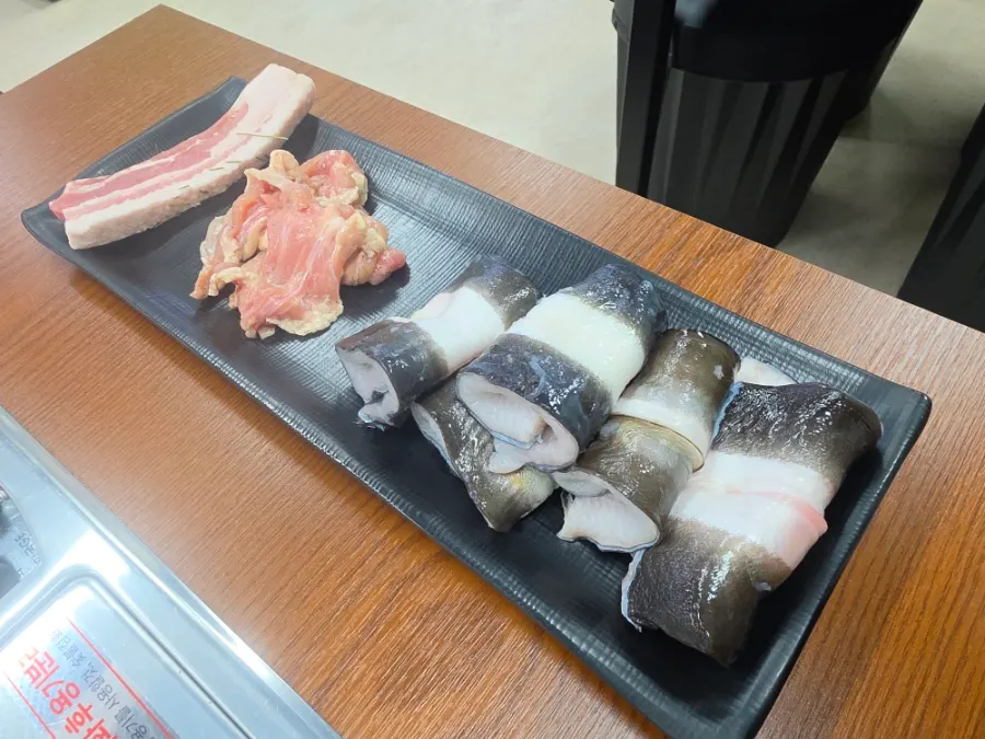 First serving of freshwater eel with chicken neck and pork belly