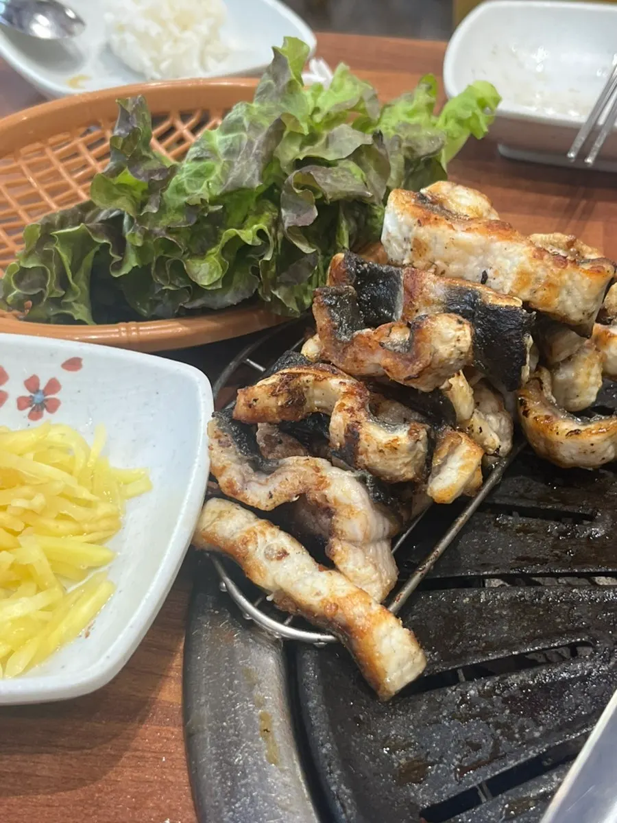 Raw freshwater eel piled on a plate