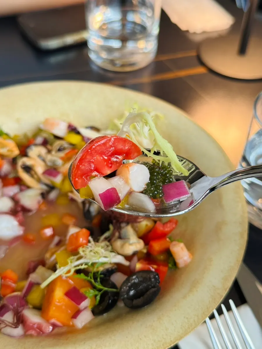 Bell peppers and onion in the seafood salad