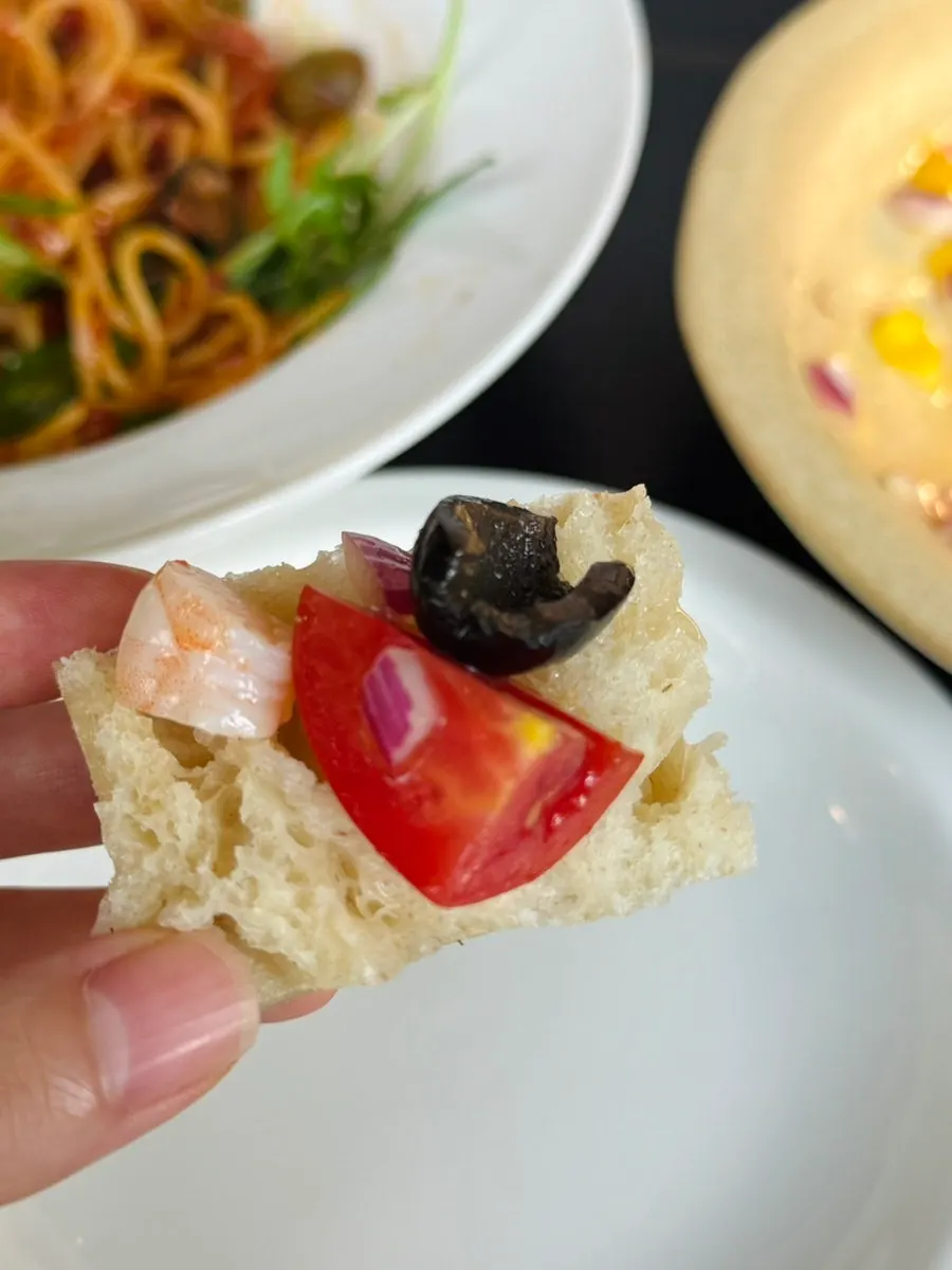 Bread served alongside the salad