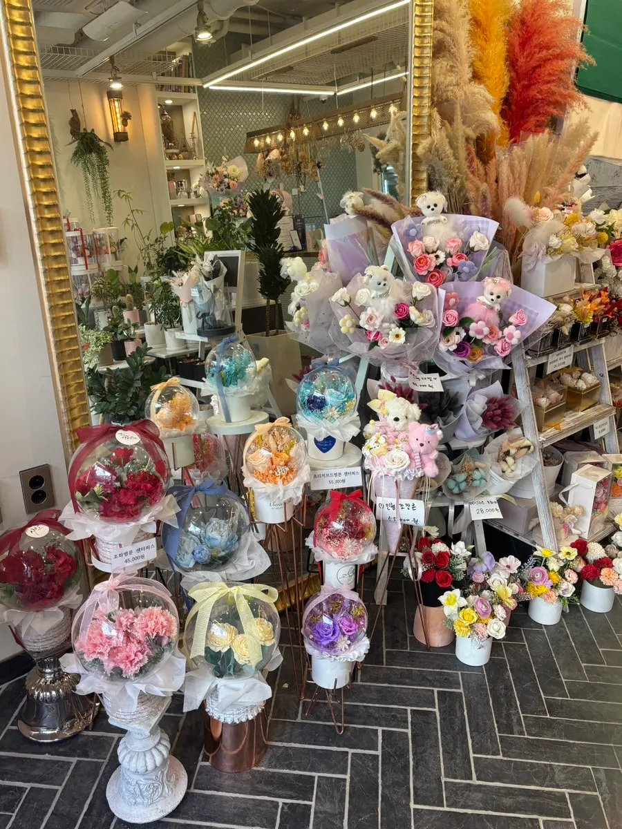 Doll bouquets and gift items on display