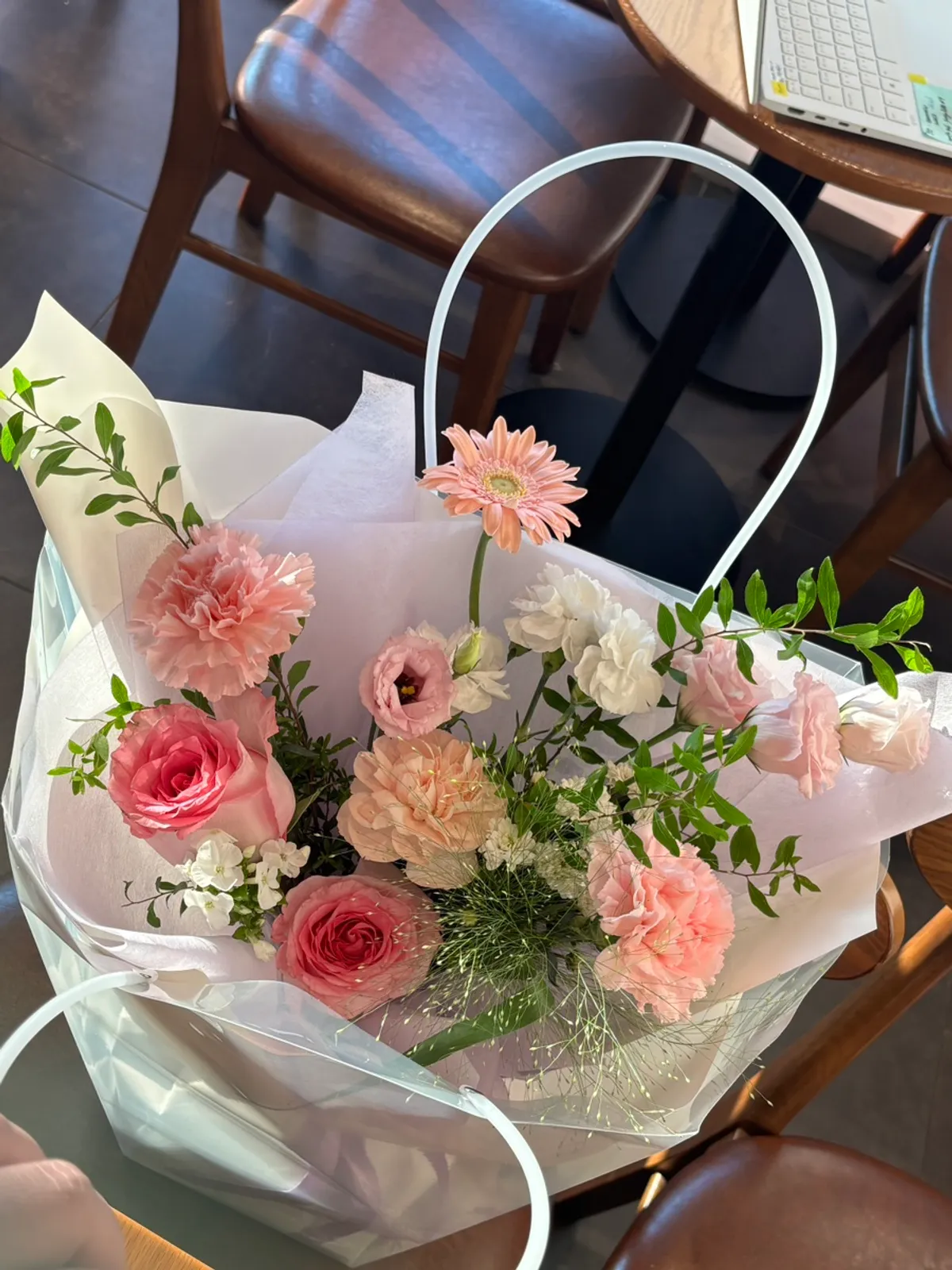 Close-up detail of the pink-and-white bouquet