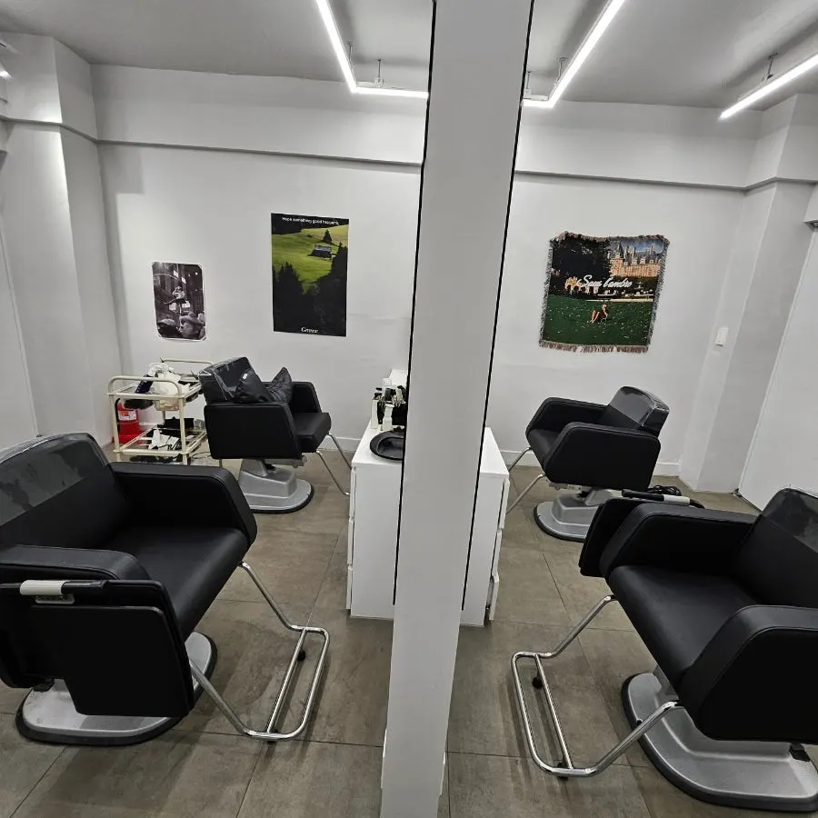 Salon interior with waiting area and styling chairs
