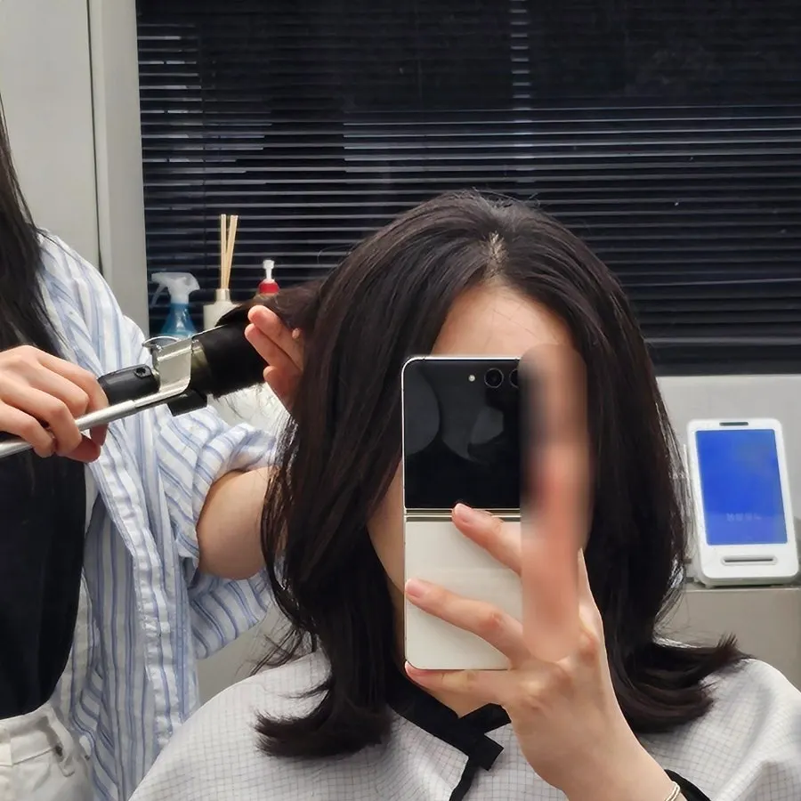 Back view of the hair at the final cutting stage