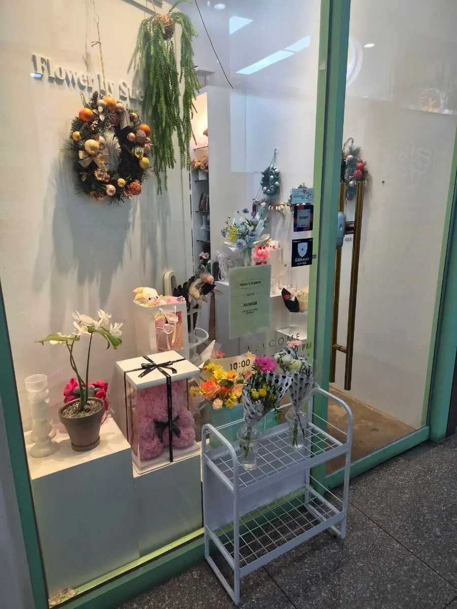 Flower shop front with today’s flower items