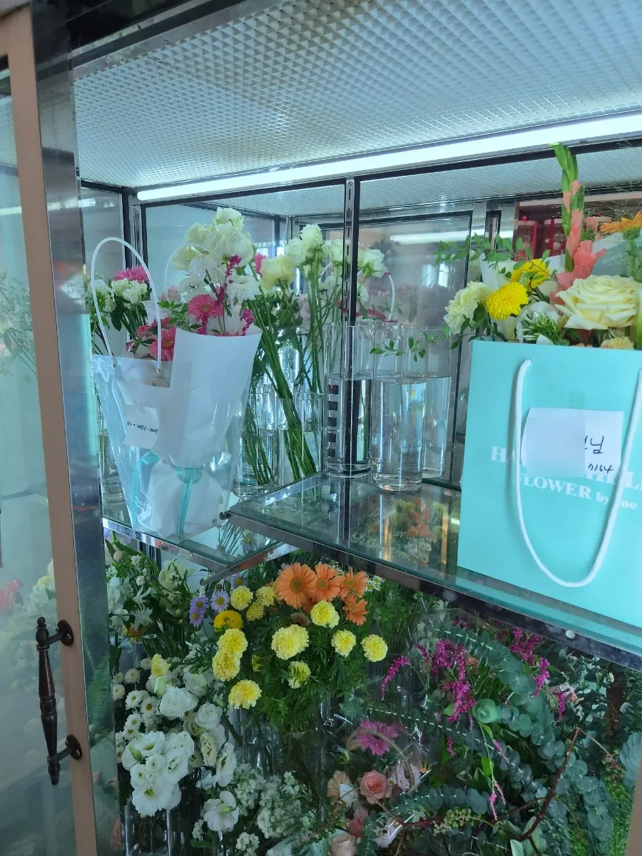 Fresh flowers, artificial flowers, soap-flower bouquets, and potted plants