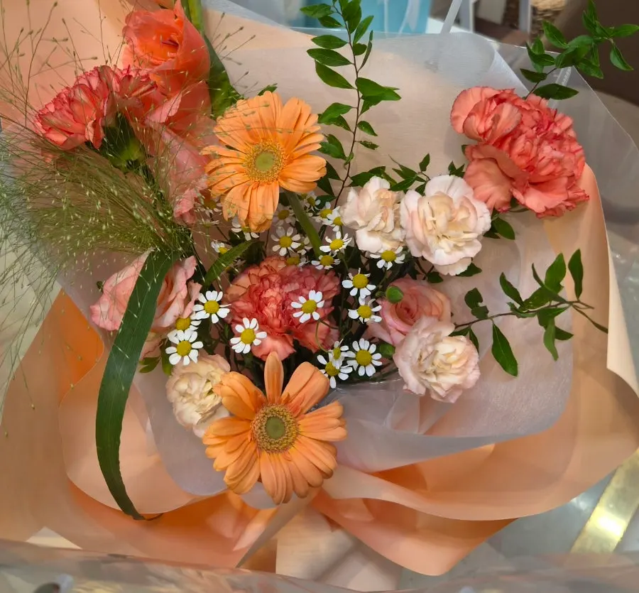 Autumn bouquet with gerberas and white flowers