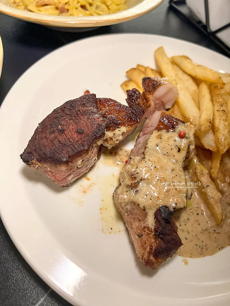 Bistec de cerdo sous vide con papas fritas