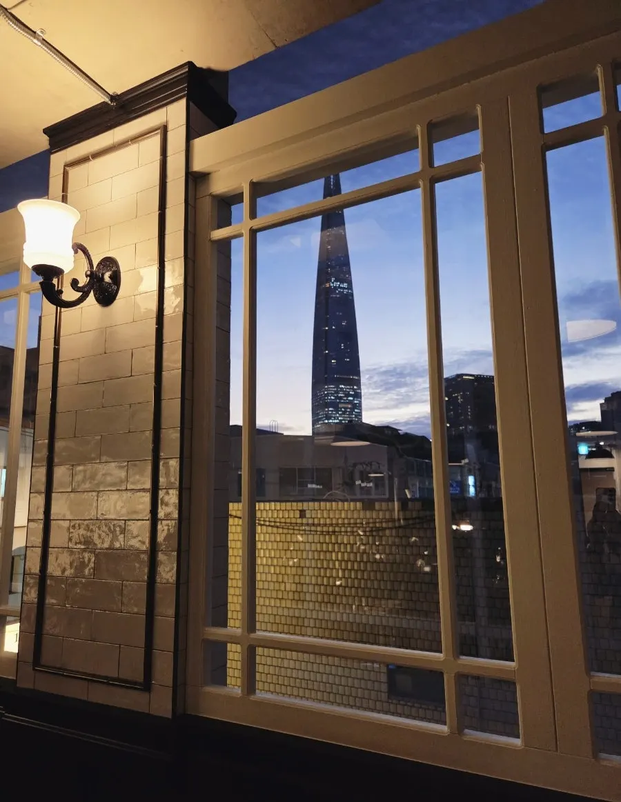 Window seating at Allegro with a view of Lotte Tower
