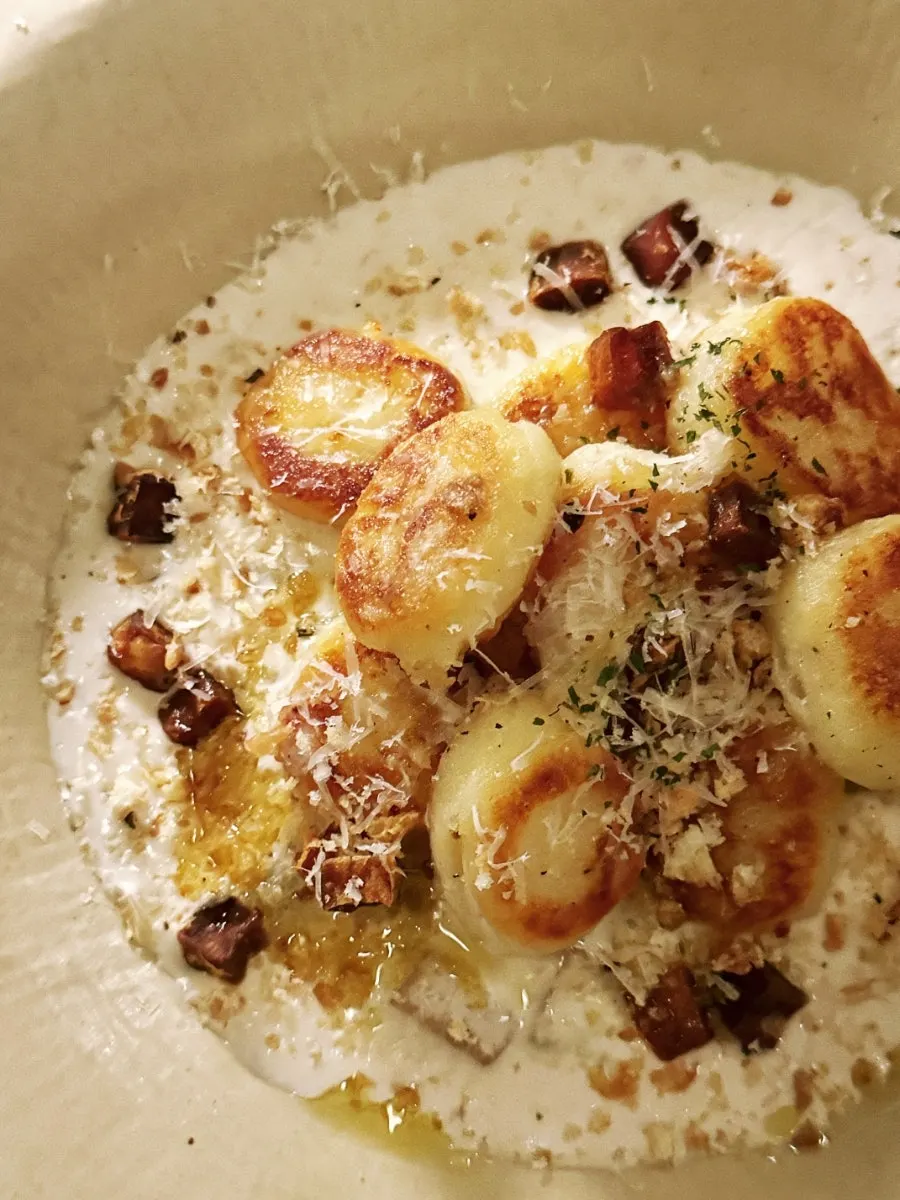 Mushroom cream potato gnocchi and pork-neck steak