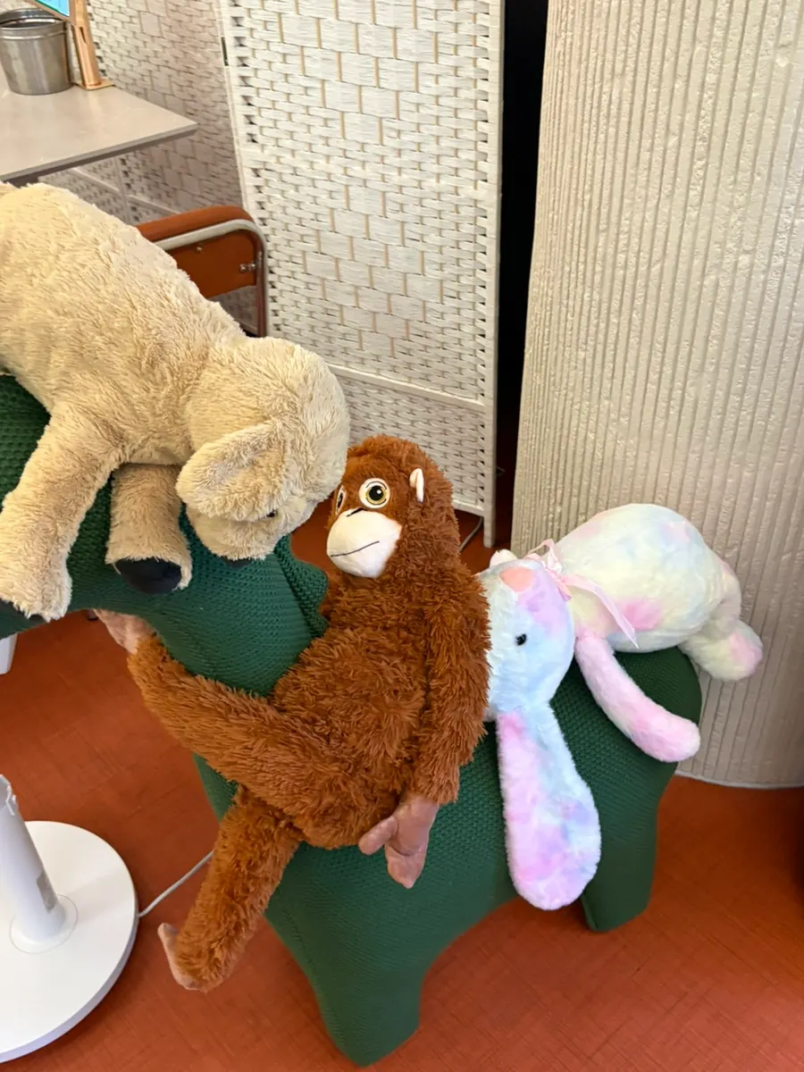 Cute doll decorations at the restaurant entrance