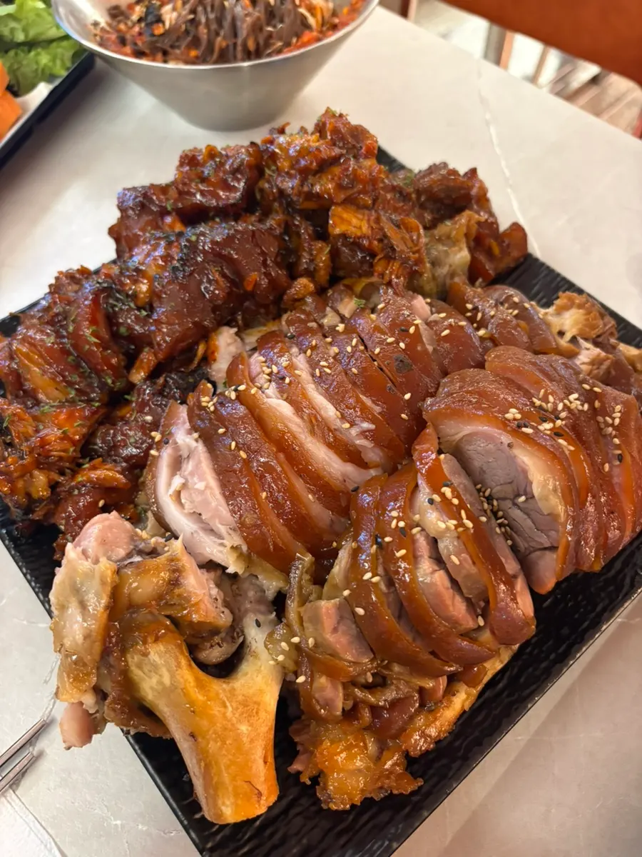 Generous table spread of half-and-half jokbal