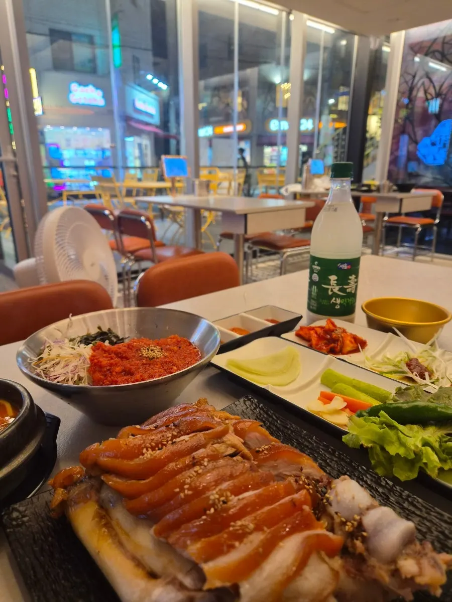 Jokbal meal with sundubu-jjigae and makguksu
