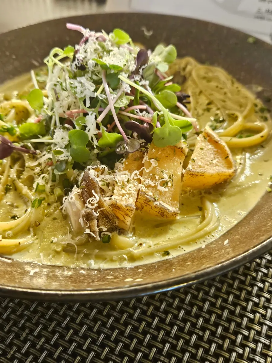 Close-up photo of abalone innards pasta