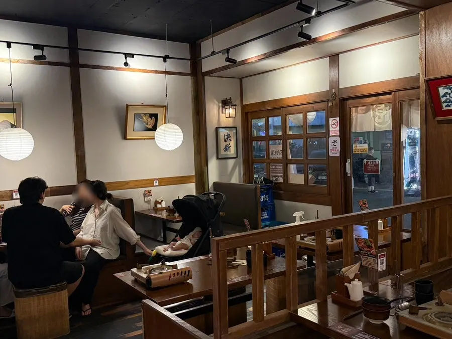 Interior of Horanggul Bangi Branch with light wood-toned decor