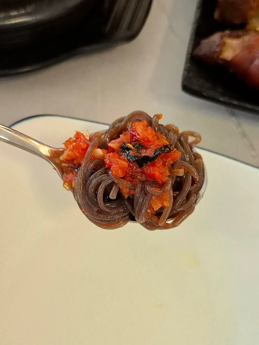 Chewy noodles in the fresh-fruit makguksu