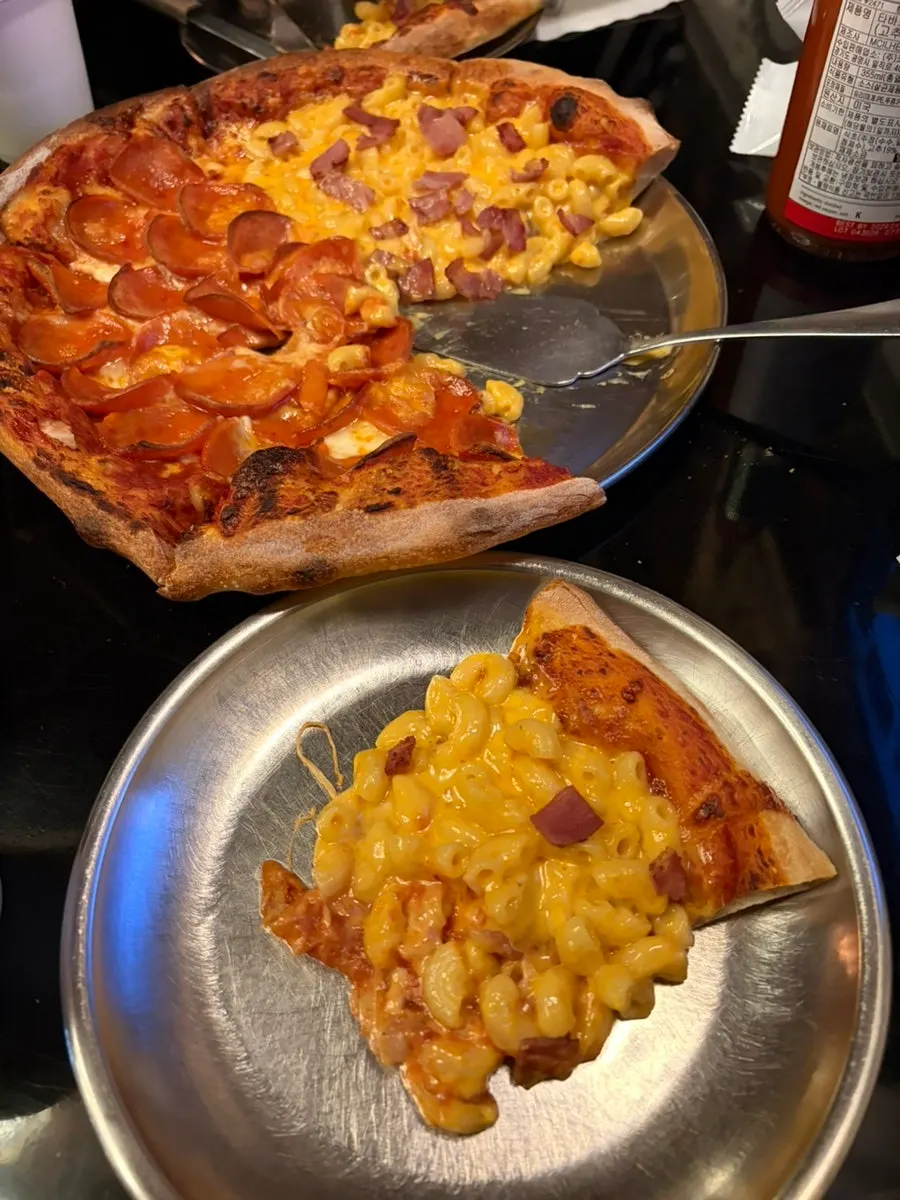 Double Pepperoni slice densely covered in pepperoni