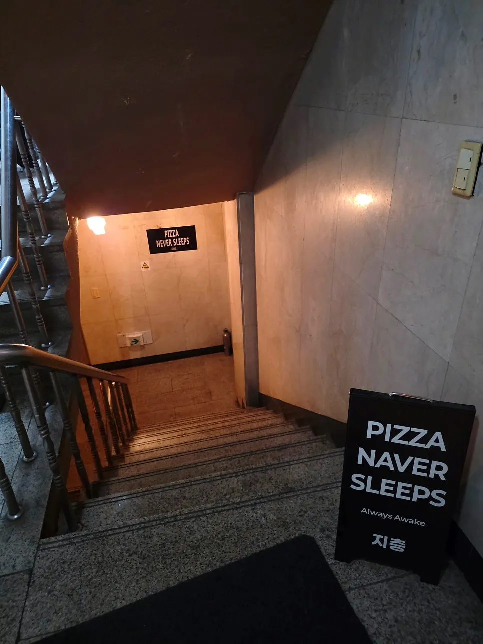Stairs leading down to the basement restaurant