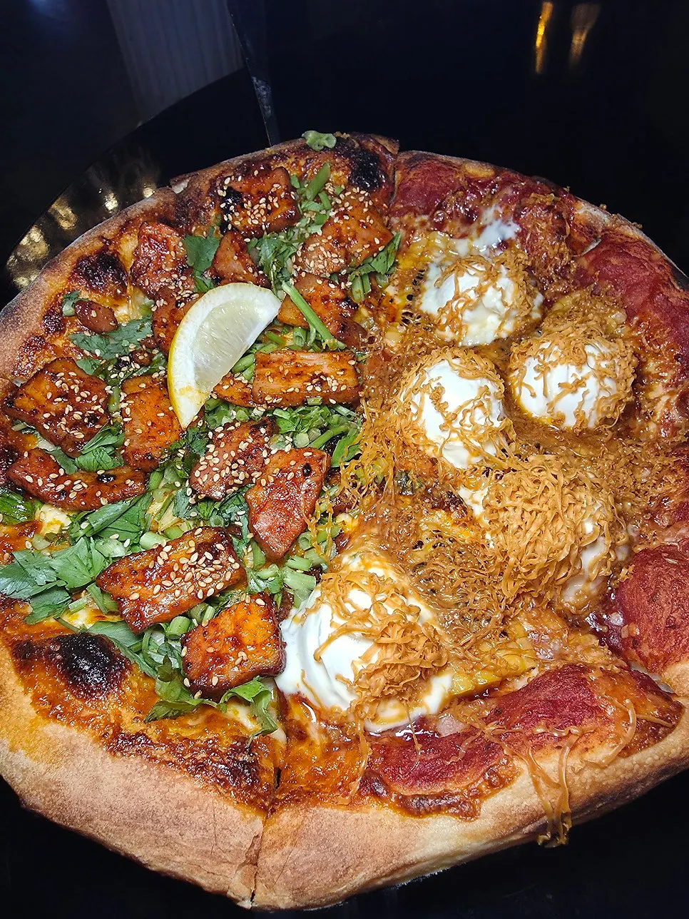 Half and half pizza set on the table