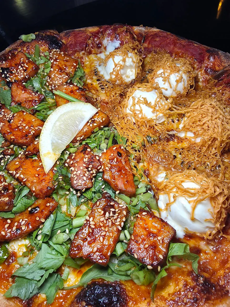 Close-up of the whole half-and-half pizza