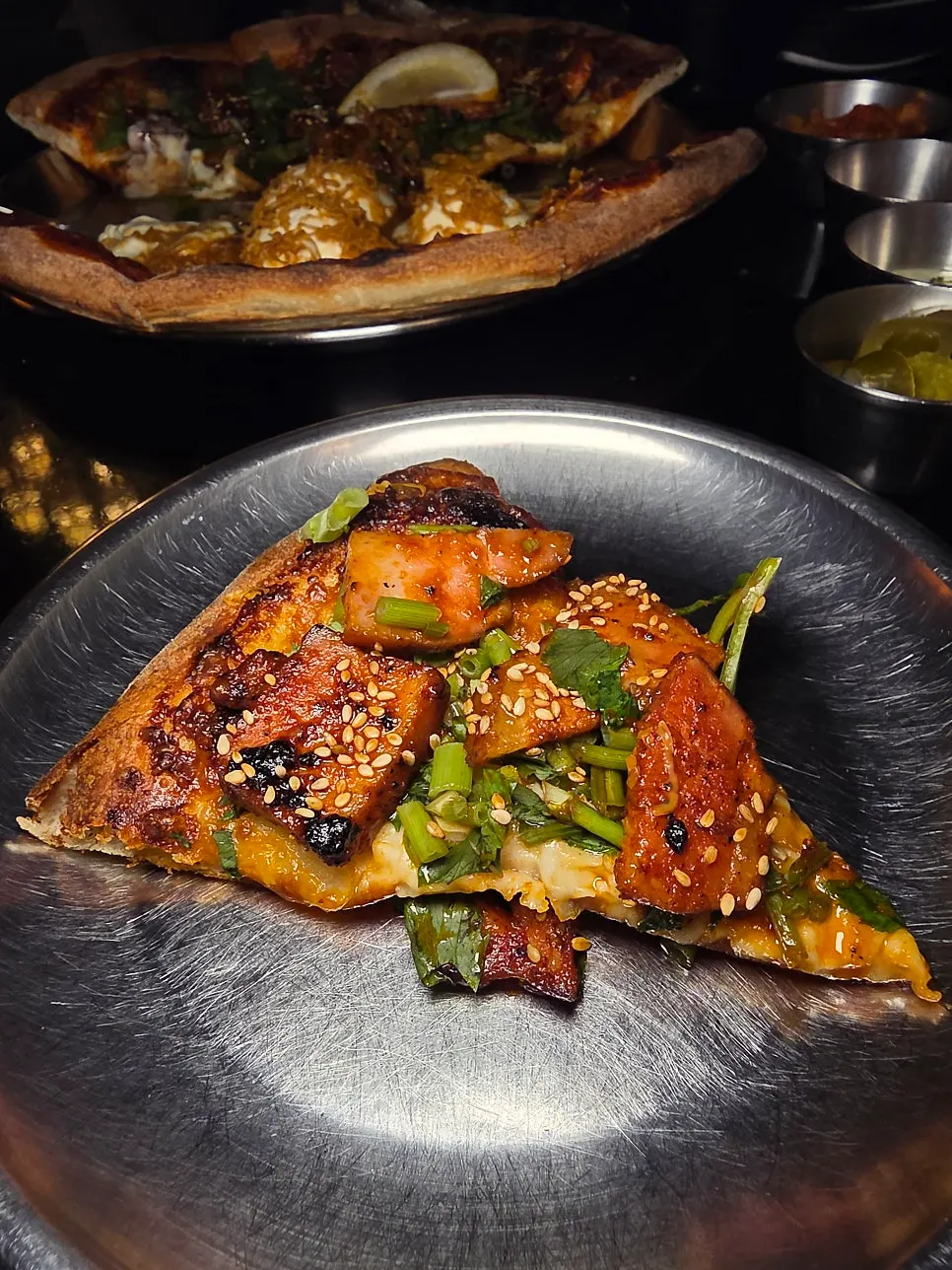 Slice of creamy Corn Brown pizza