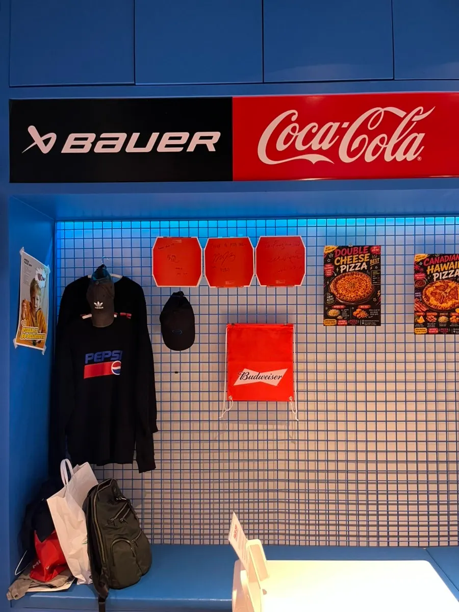 Pizza Face Off merchandise displayed on one side