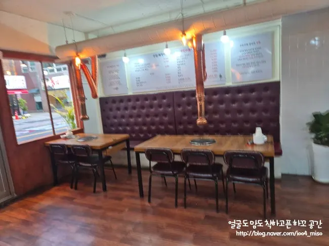 Interior view of Songnim Bok Jangeo with tables set up