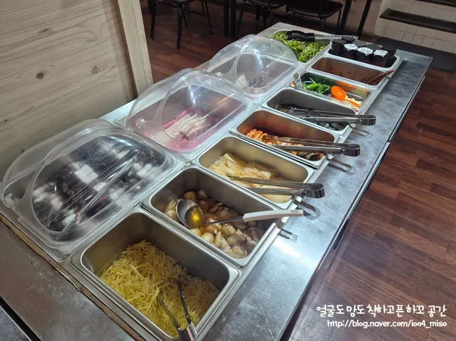Self-bar side dish corner with kimchi and wrap vegetables