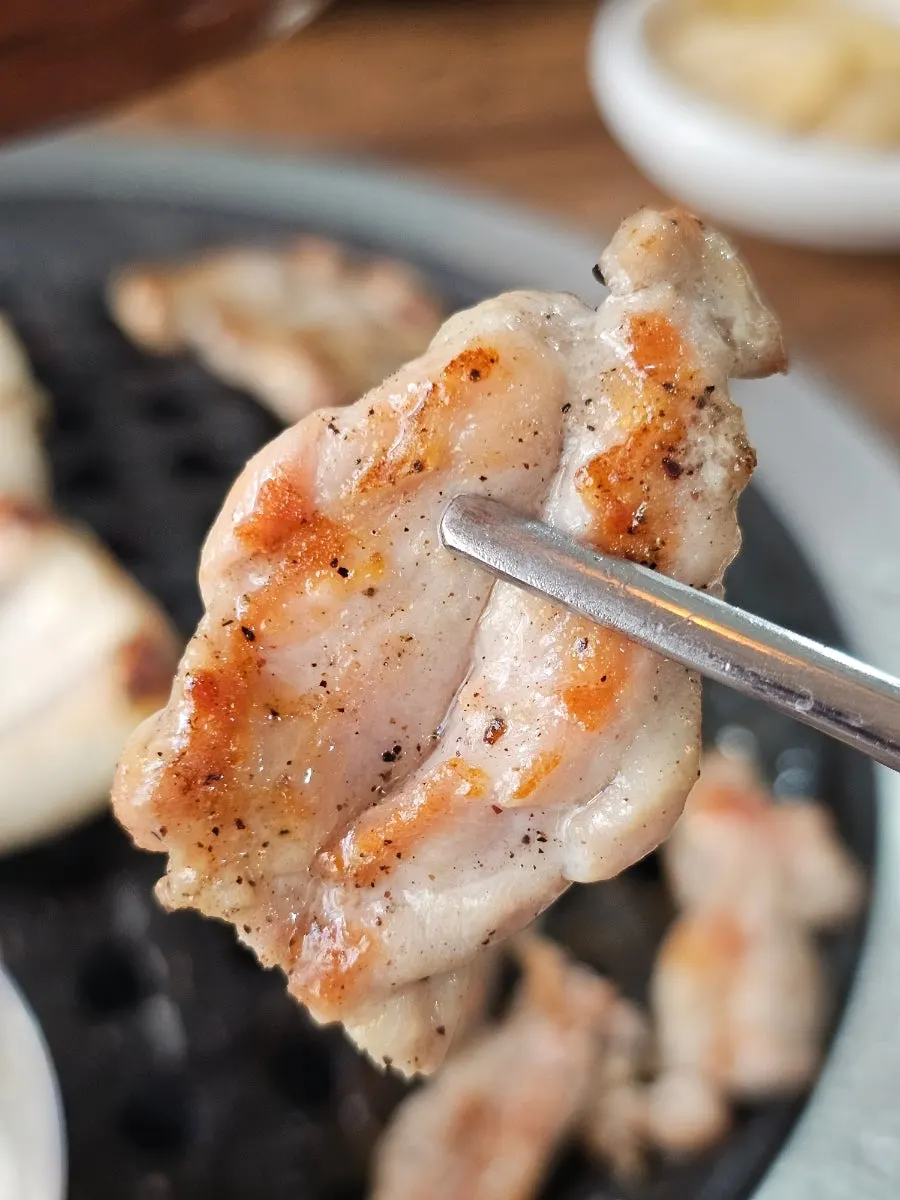 Chicken neck meat grilling on the plate