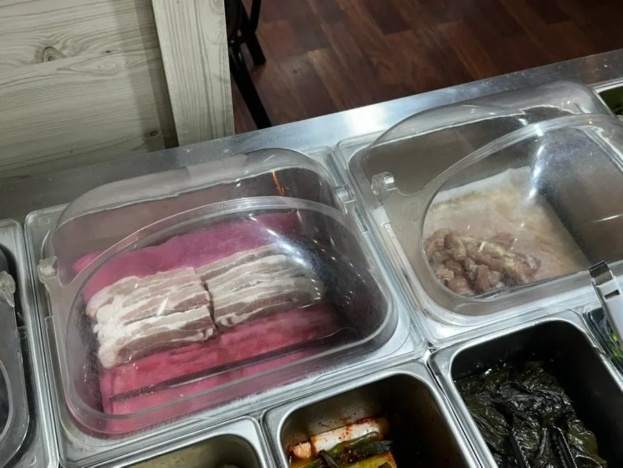 Self-serve bar with wrapping vegetables and sauces