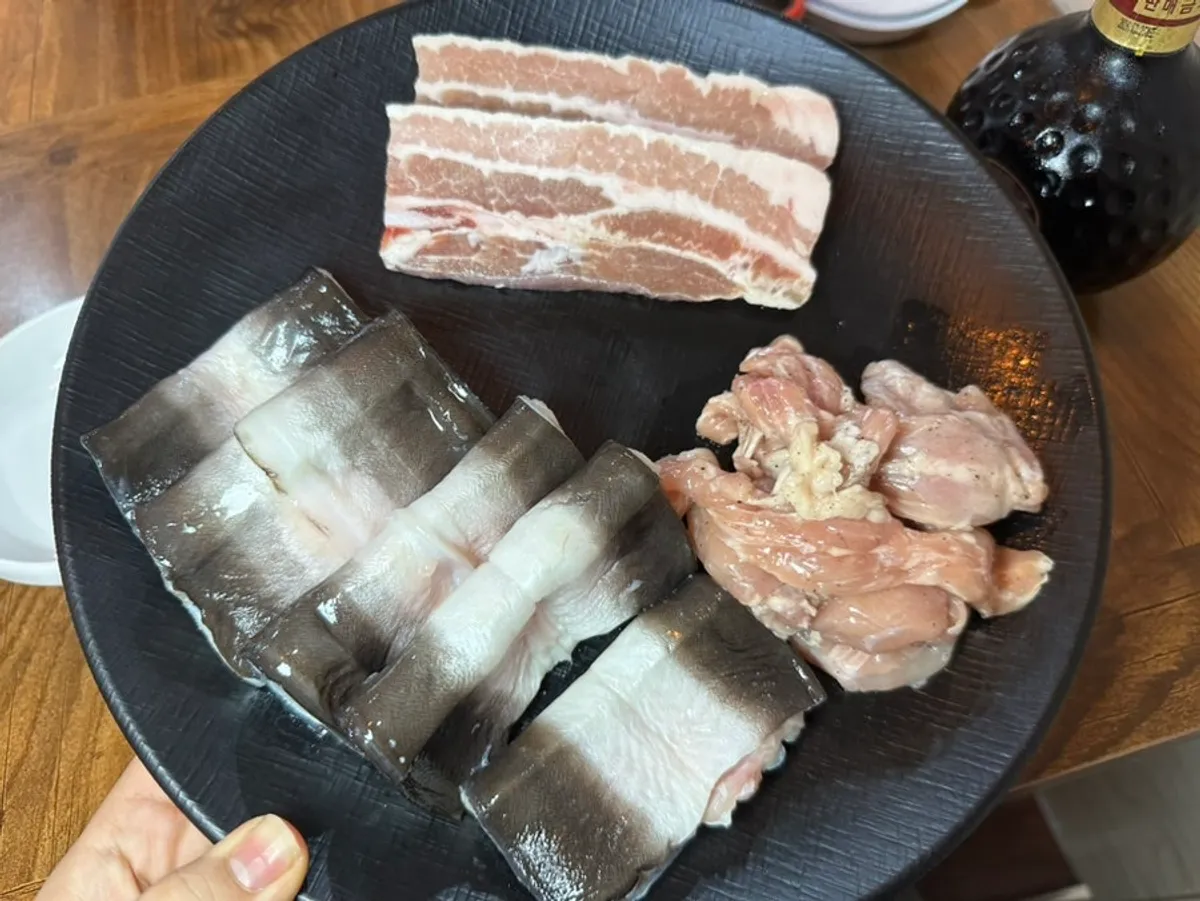Freshwater eel on the grill with complimentary bokbunja wine