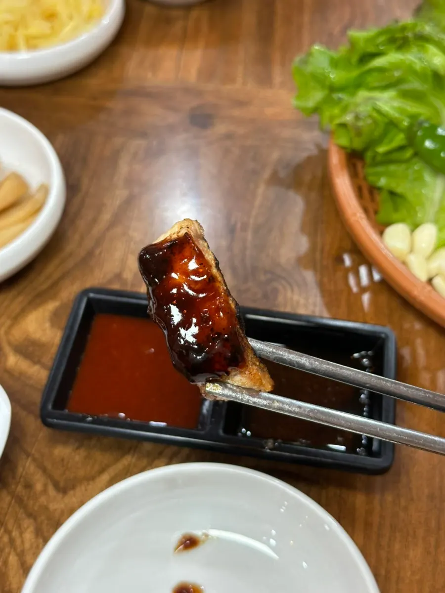 A thick, well-cooked piece of freshwater eel