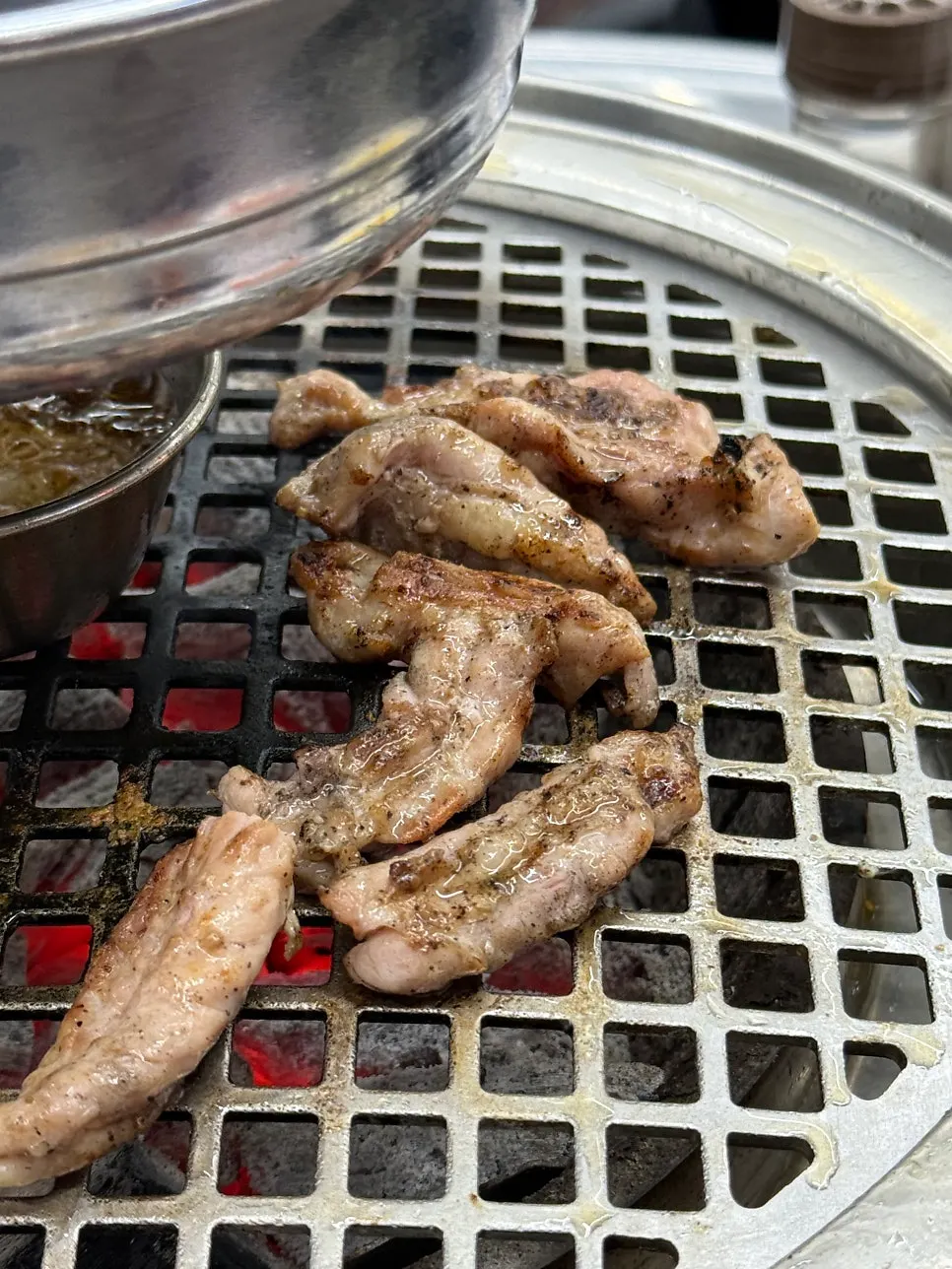 Chicken neck on the charcoal grill