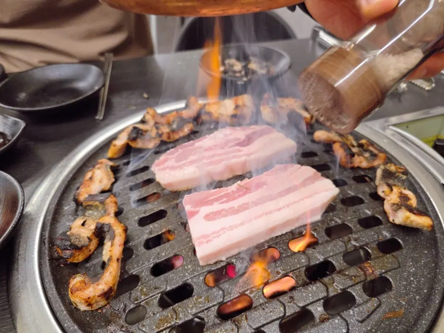A child's bowl of rice topped with eel