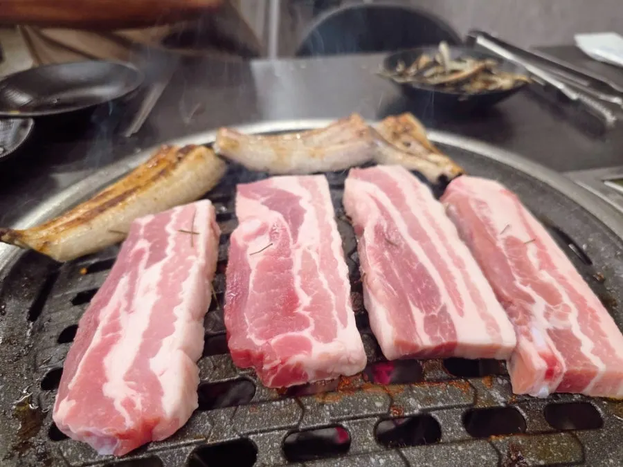 Pork belly and baek-kimchi wrapped in a perilla leaf