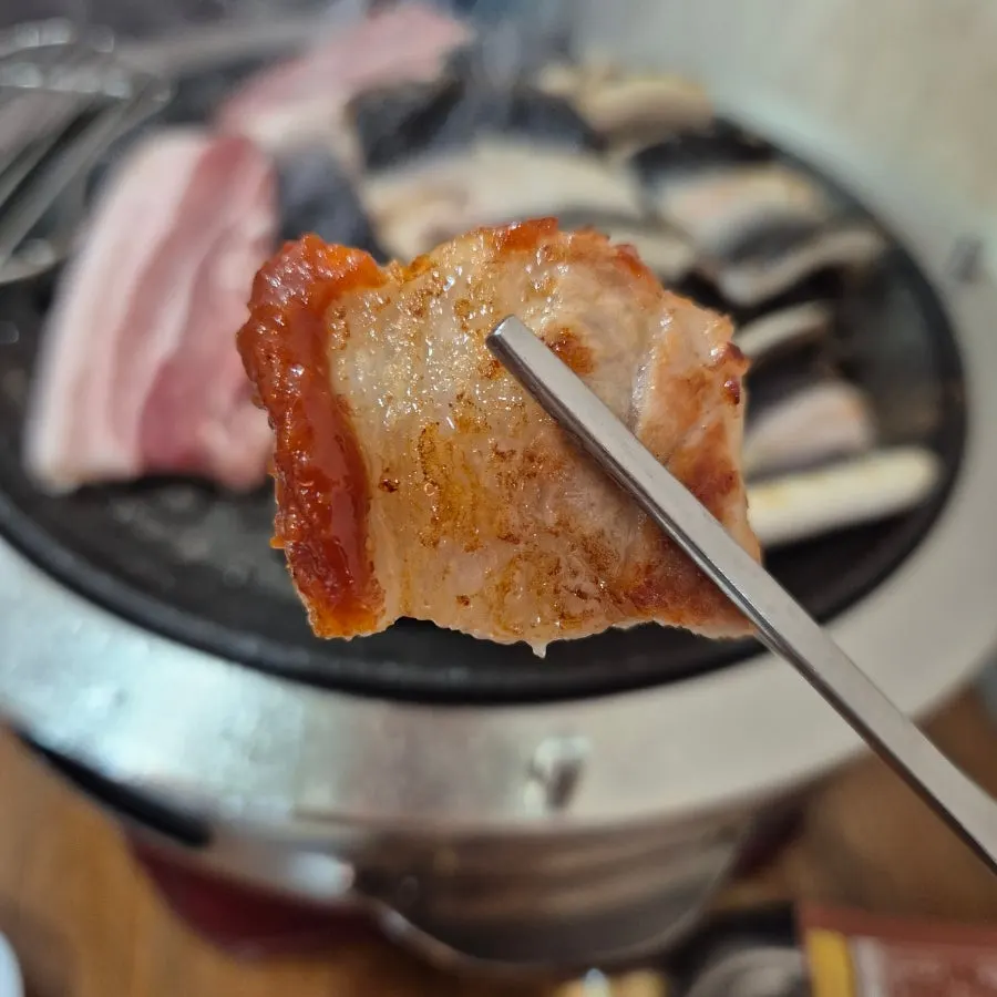 Pork belly wrapped in white kimchi