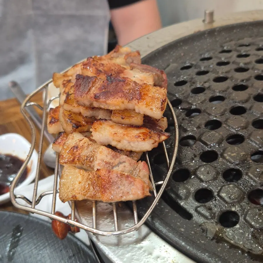 Close-up of golden-grilled pork belly