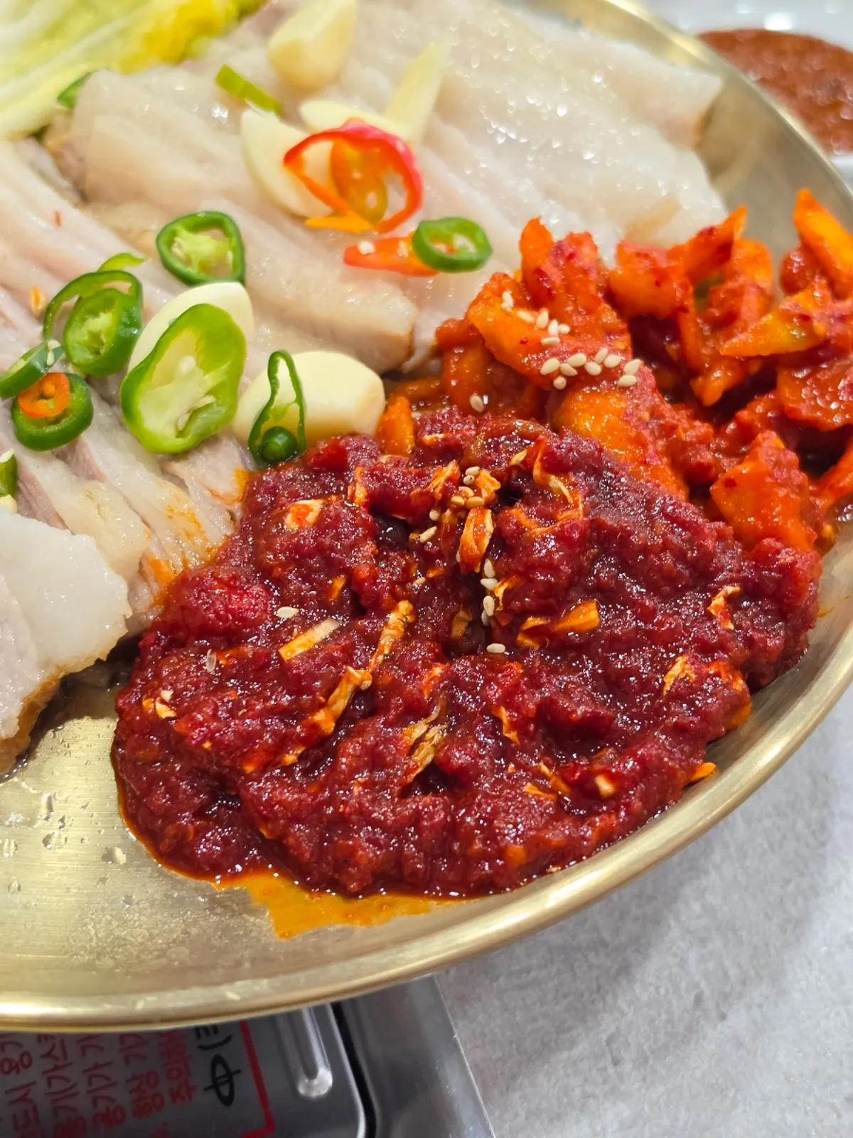 Glistening gabri pork bossam with brined cabbage