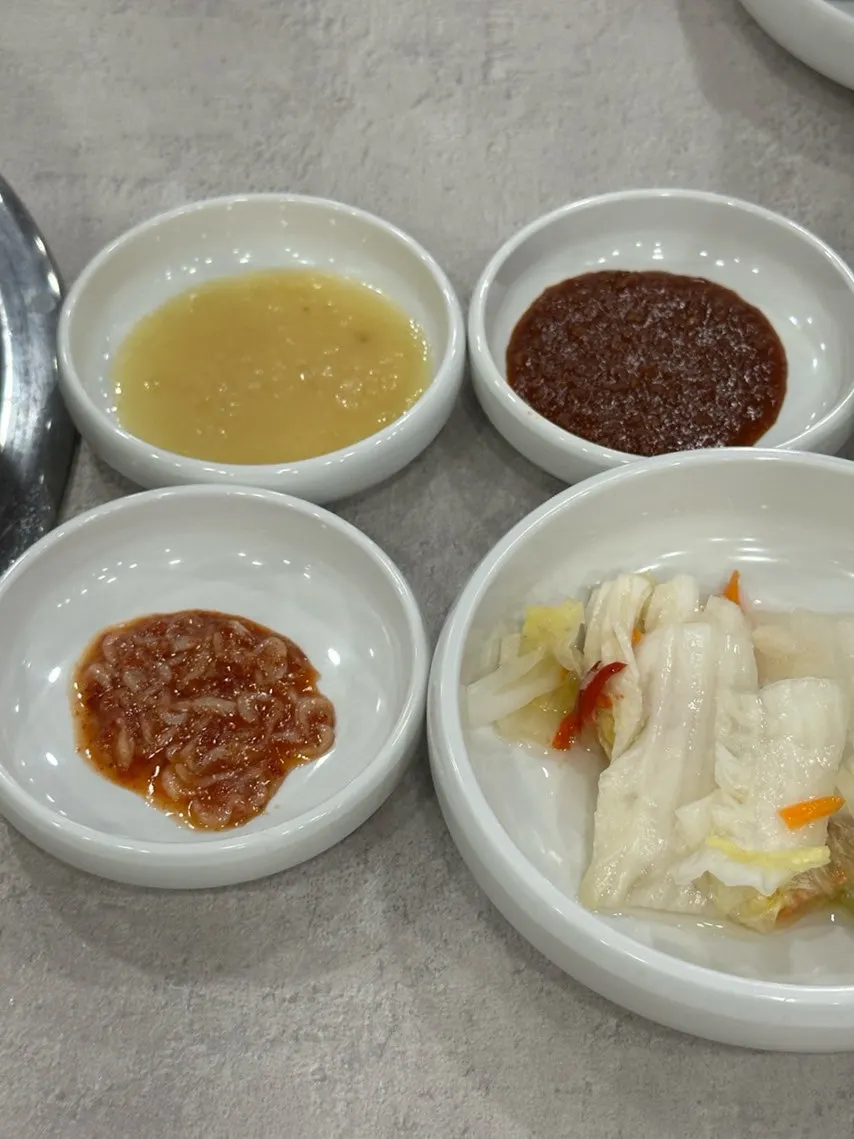Bossam sauces including salted shrimp, seasoning sauce and garlic sauce