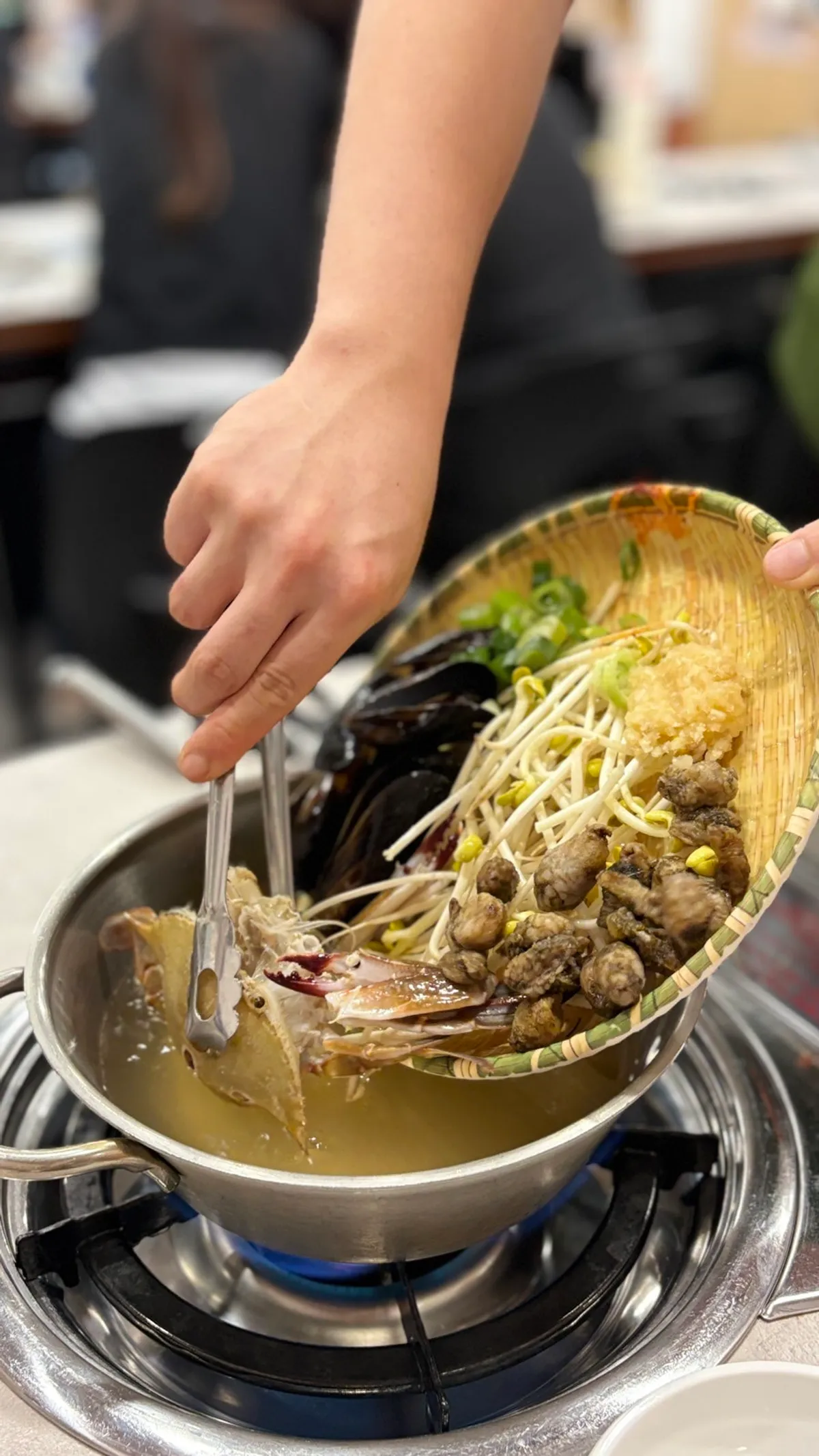 Ingredients in the kalguksu pot before boiling
