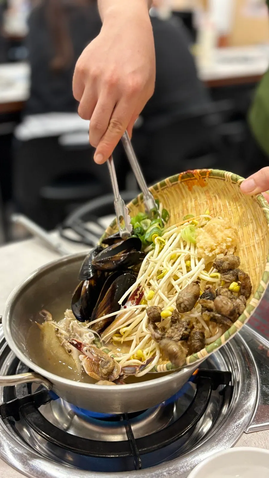 Close-up of the kalguksu ingredients and broth