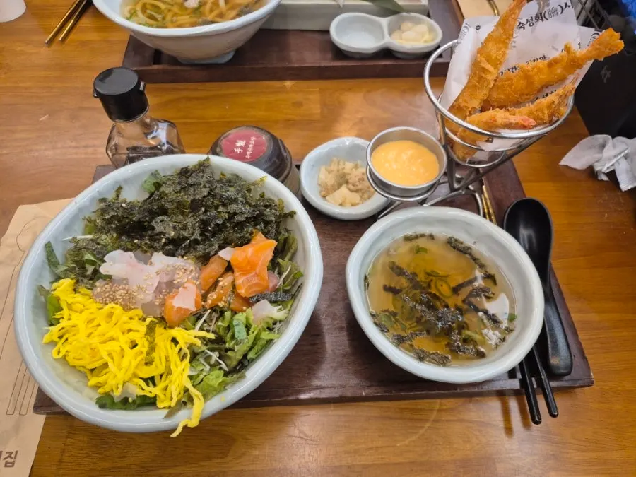 Full spread of the two-person value set sashimi rice bowl